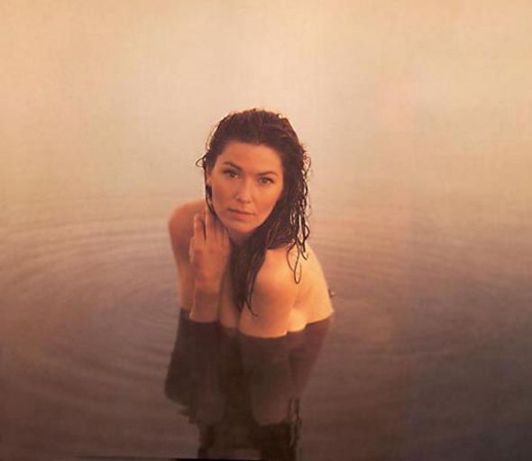 asif hussain recommends shania twain swim suit pic