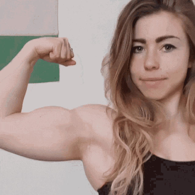 adam pantlin recommends muscle girl flexing biceps pic