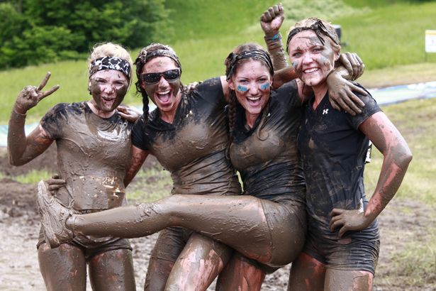 catherine sully add camp bucca mud wrestling photo