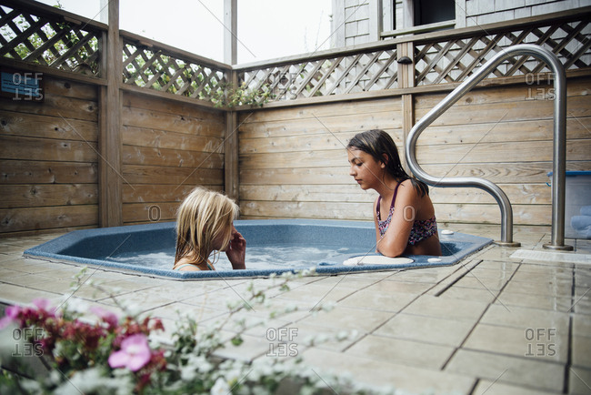 dave chomyn recommends girls kissing in hot tub pic