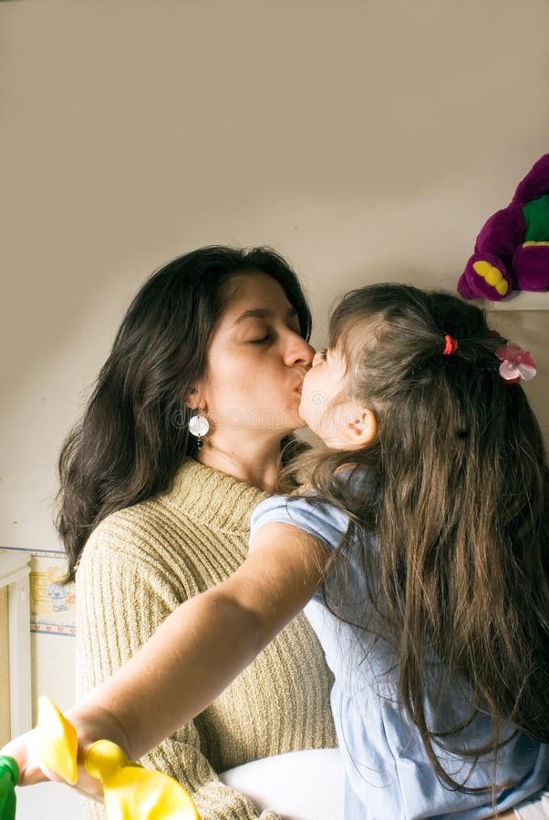 real mom and daughter kissing