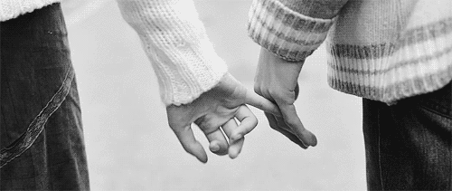 couple holding hands gif