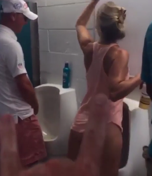 barb skidmore add woman peeing in urinal photo