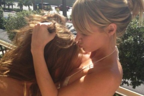 girls motorboating each other