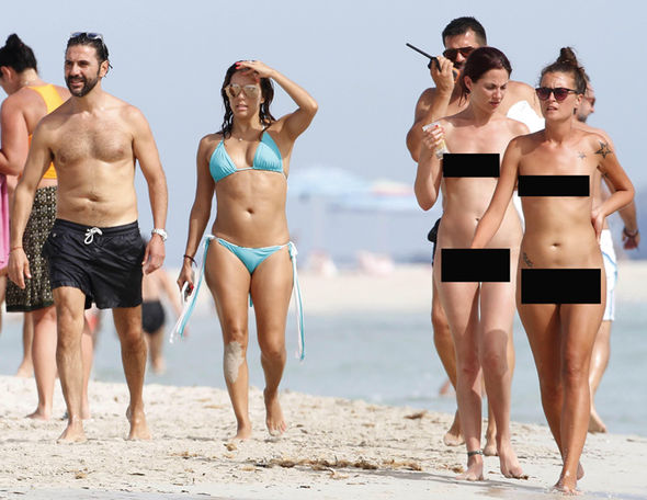 Best of Naked women walking on beach