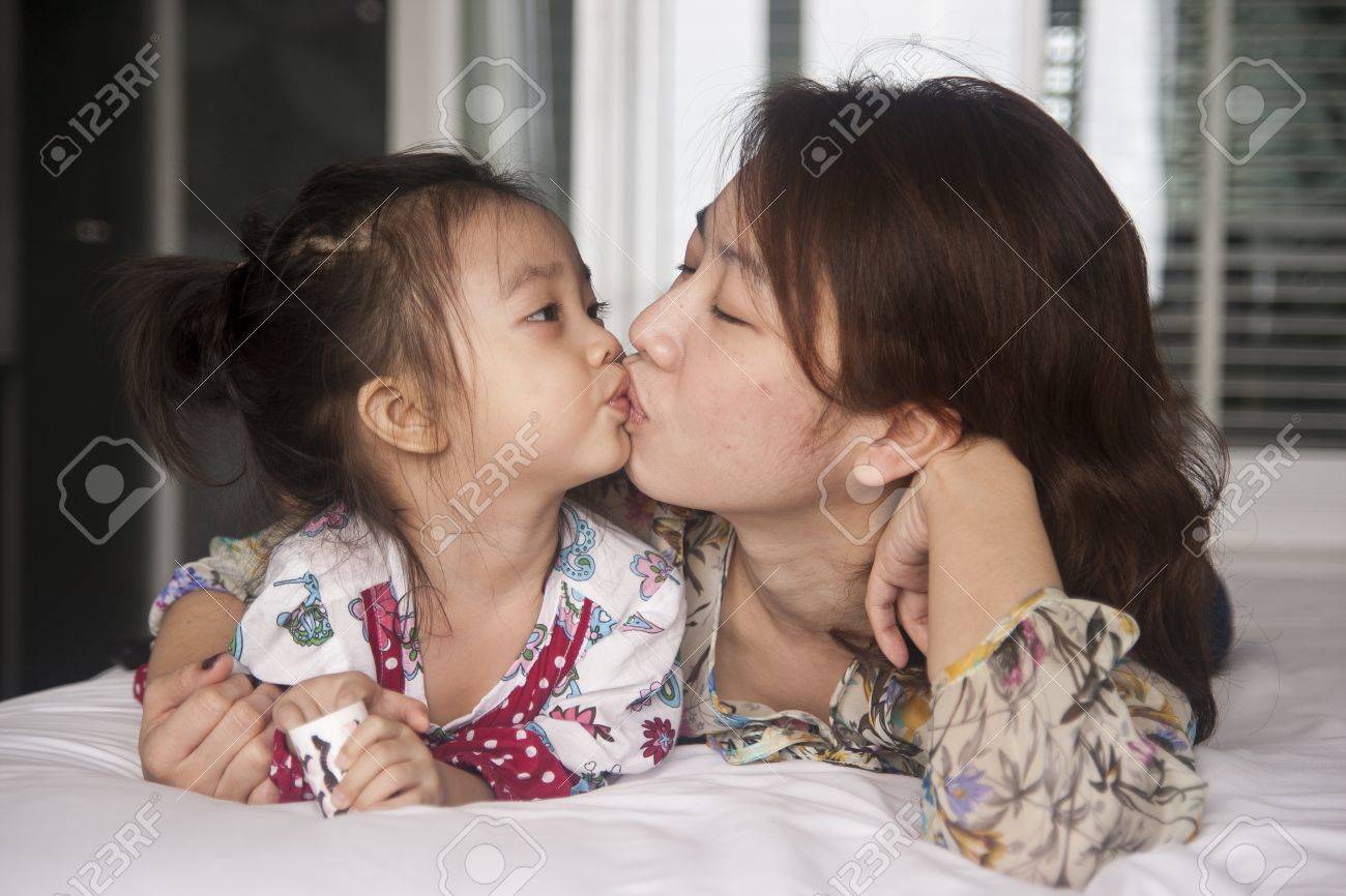 Best of Real mom and daughter kissing