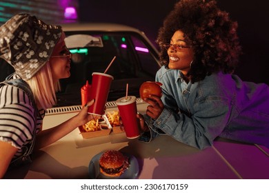two girls eating out