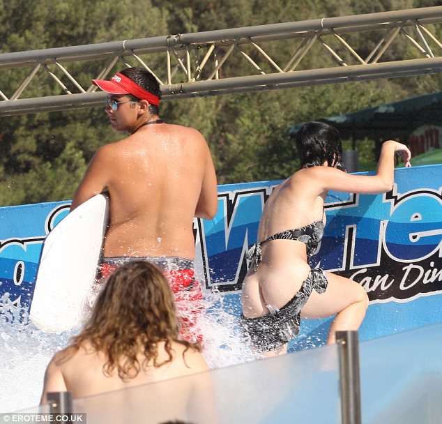 carroll tracy share water slide bathing suit malfunction photos