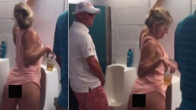 woman peeing in urinal
