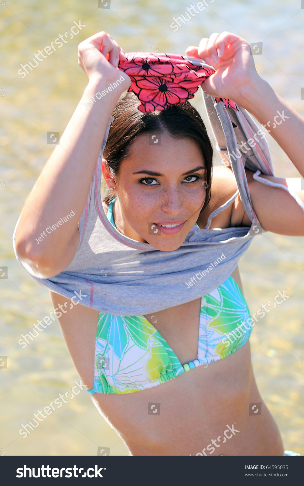 danny fabrizio add woman removing bathing suit photo